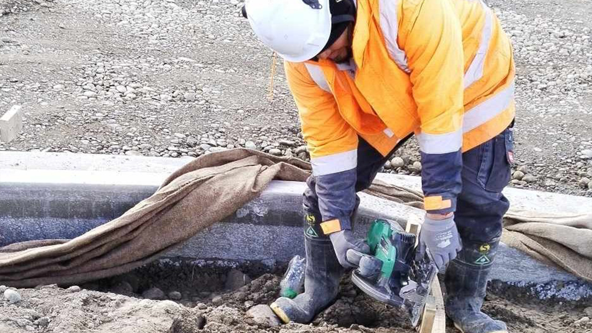 Road worker carrying out site works